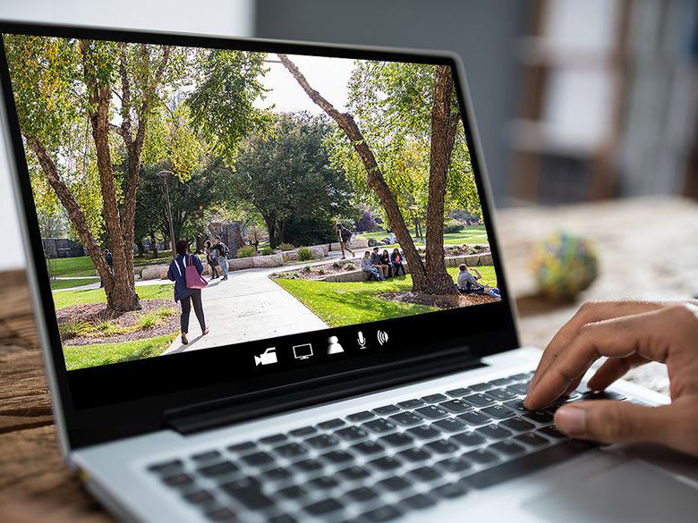 Student taking a virtual tour on a laptop